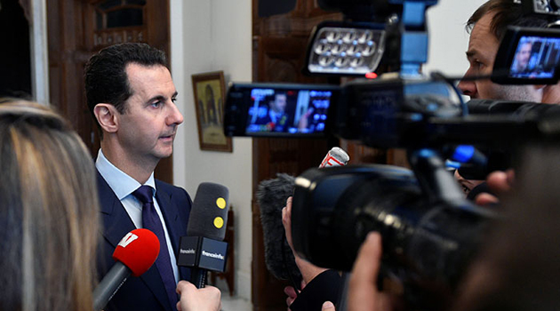Syria's President Bashar al-Assad speaks to French journalists in Damascus, Syria, in this handout picture provided by SANA on January 9, 2017. SANA/Handout via REUTERS ATTENTION EDITORS - THIS IMAGE WAS PROVIDED BY A THIRD PARTY. EDITORIAL USE ONLY. REUTERS IS UNABLE TO INDEPENDENTLY VERIFY THIS IMAGE. - RTX2Y26B