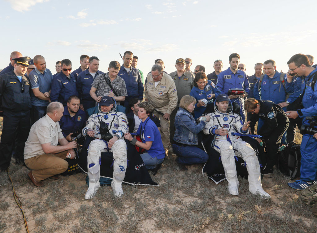 The International Space Station (ISS) crew rests after landing in a remote area outside the town of Dzhezkazgan (Zhezkazgan), Kazakhstan