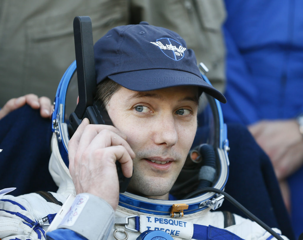 Members of the International Space Station (ISS) crew Thomas Pesquet of France speaks on a phone after landing in a remote area outside the town of Dzhezkazgan (Zhezkazgan), Kazakhstan June 2, 2017. REUTERS/Shamil Zhumatov